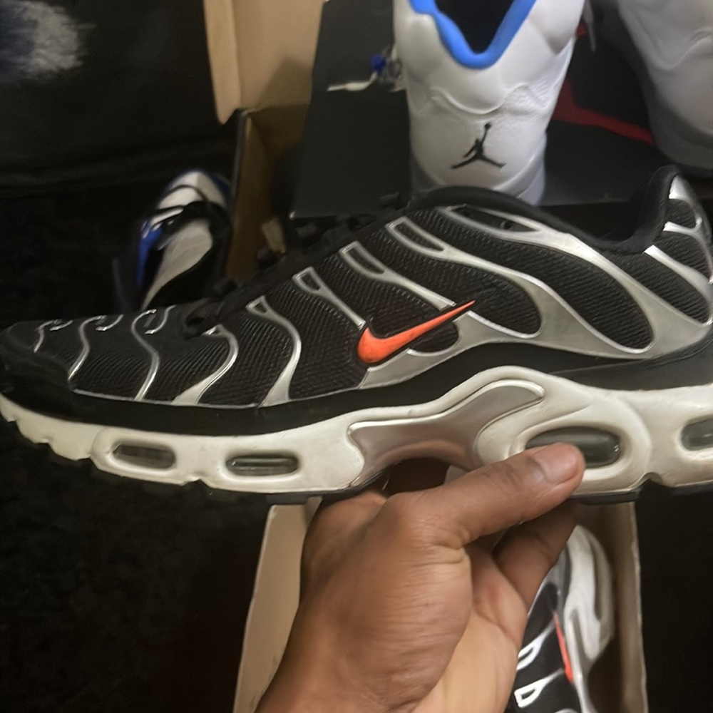 A pair of air max without the shoe strings